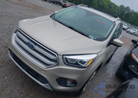 2017 Ford Escape Titanium z USA, uszkodzony, nr VIN 1FMCU0J93HUB64809